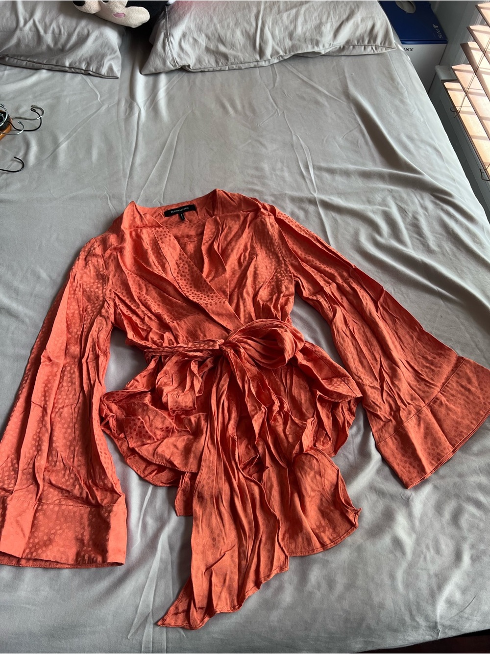 BCBGMAXAZRIA Dotted Satin Wrap Top in Papaya/Orange
